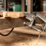 Carpenters use wood clamps on wood Craft.